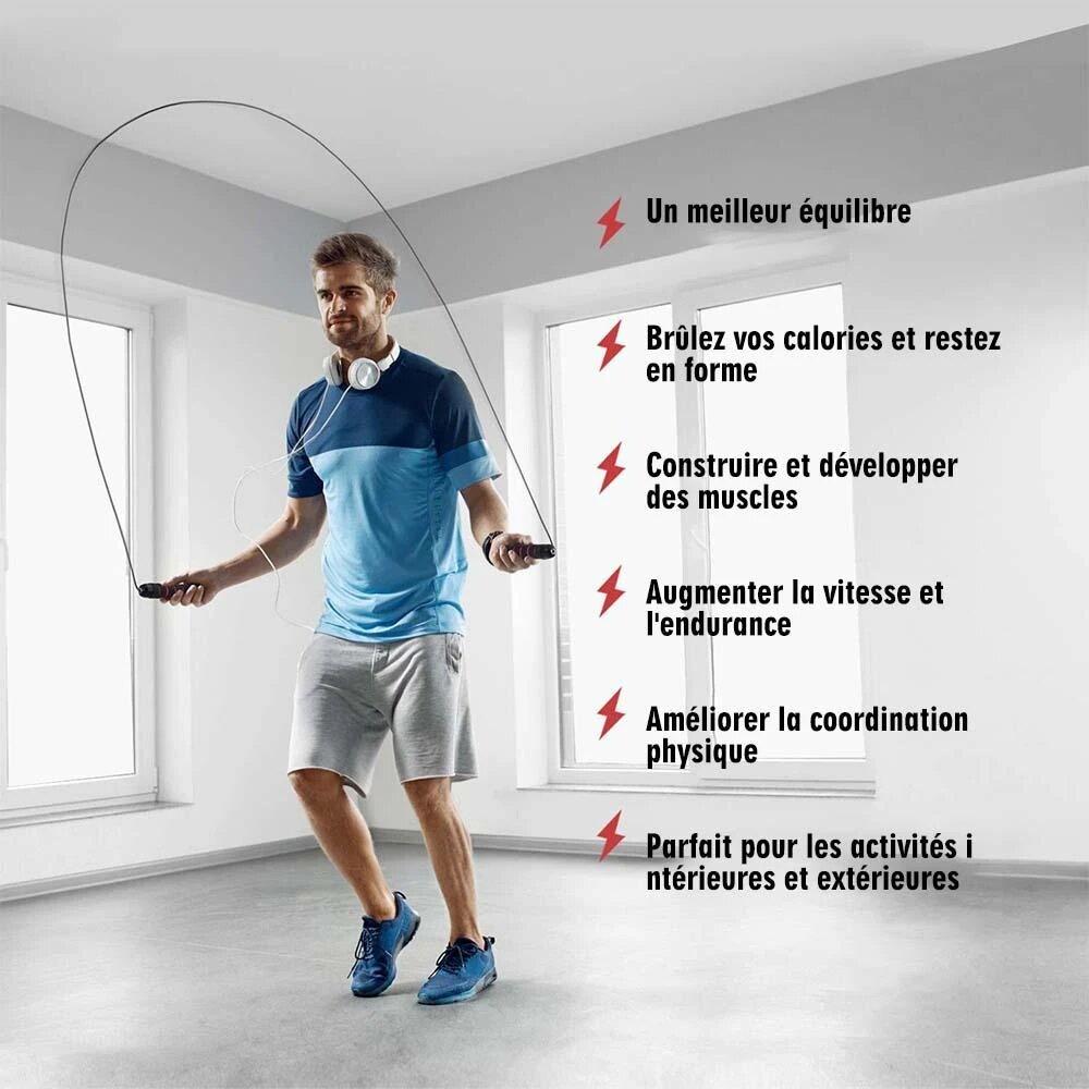 a man standing on a tennis court holding a tennis racquet