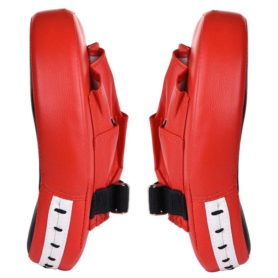 a pair of red shoes sitting next to each other