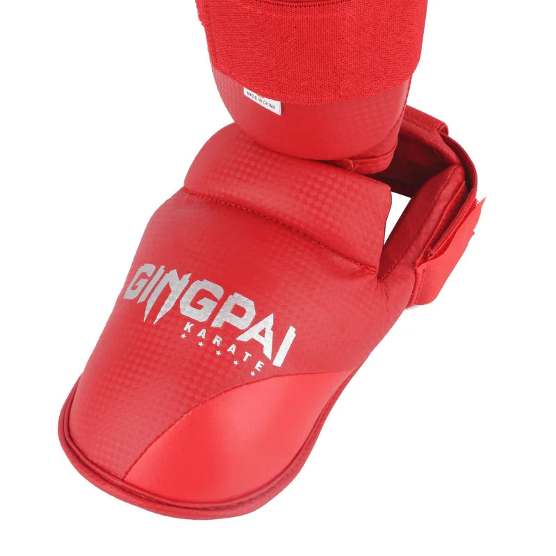 PROTEGE TIBIA ET PIED KARATE CUIR ROUGE