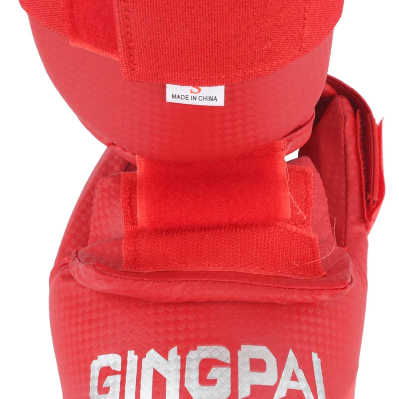 PROTEGE TIBIA ET PIED KARATE CUIR ROUGE