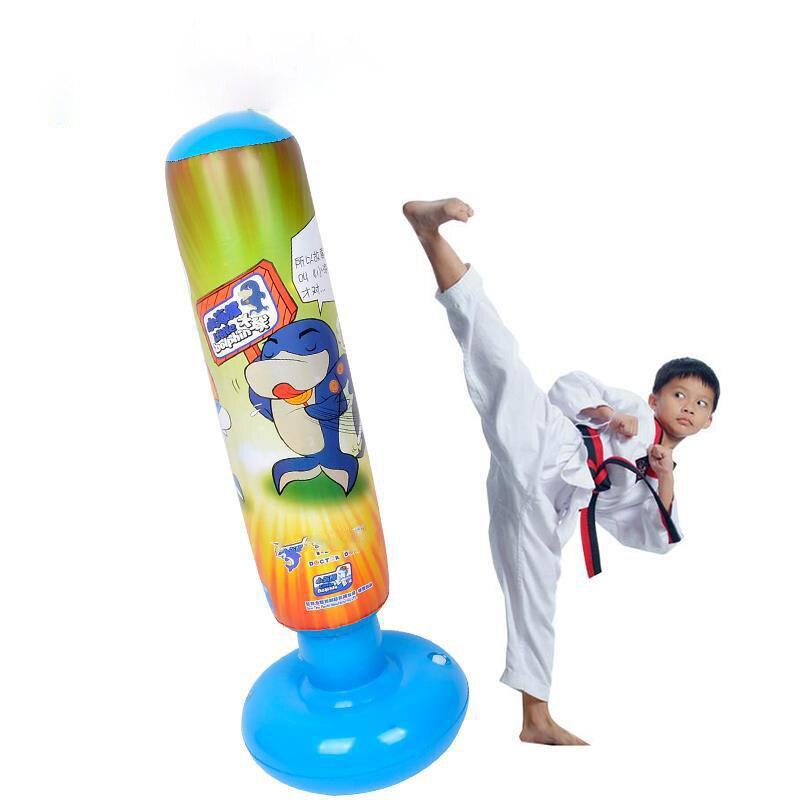 a man is holding a snowboard in the air