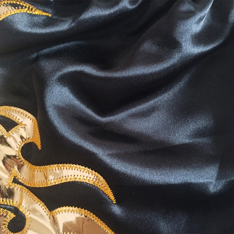 a close up of a black and black shoes