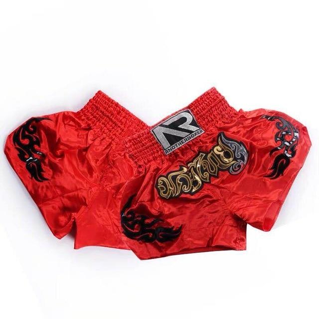 a red bed with a red blanket and a red pillow